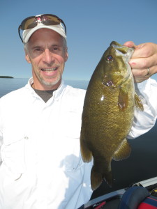 Dad Bill Jansen follows with first fish.